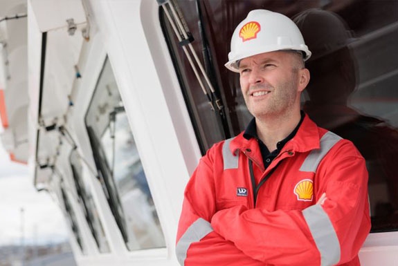 Royal Dutch Shell employee turns a knob at the St. Charles Refinery